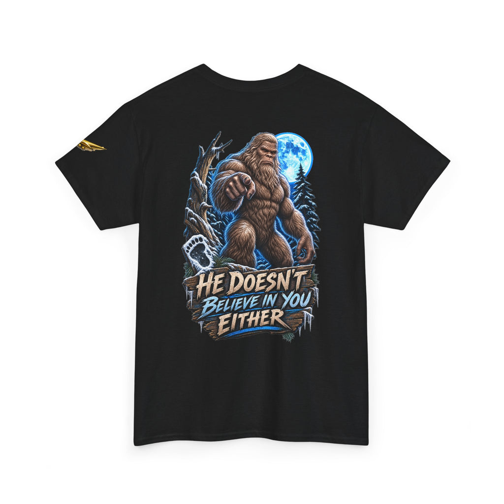 T-Shirt — “He Doesn’t Believe in You Either” Bigfoot Graphic Tee
