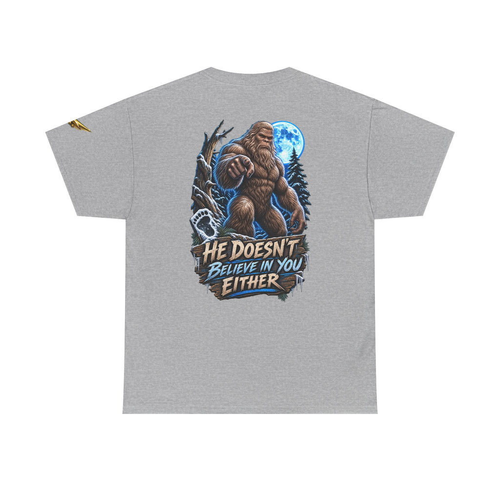 T-Shirt — “He Doesn’t Believe in You Either” Bigfoot Graphic Tee