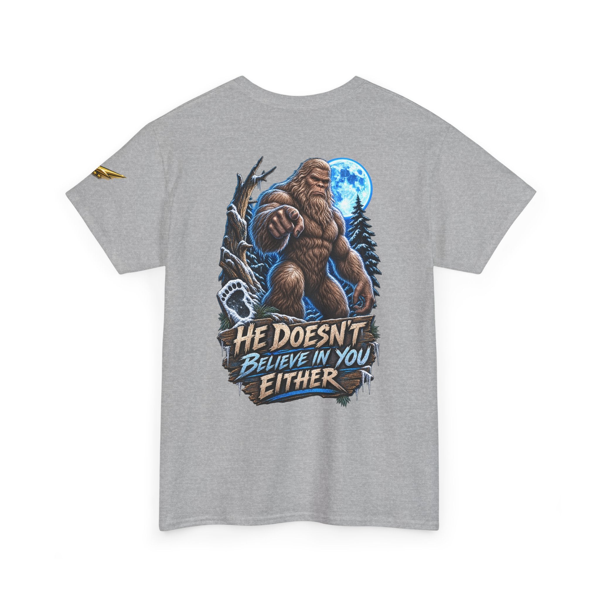 T-Shirt — “He Doesn’t Believe in You Either” Bigfoot Graphic Tee